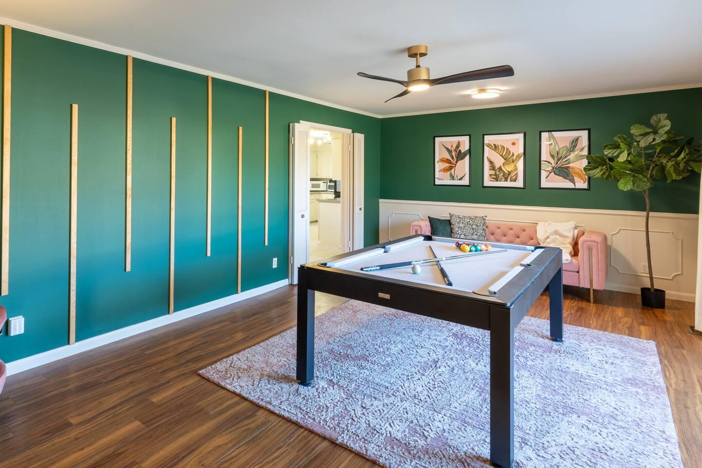Front living room with a pool table